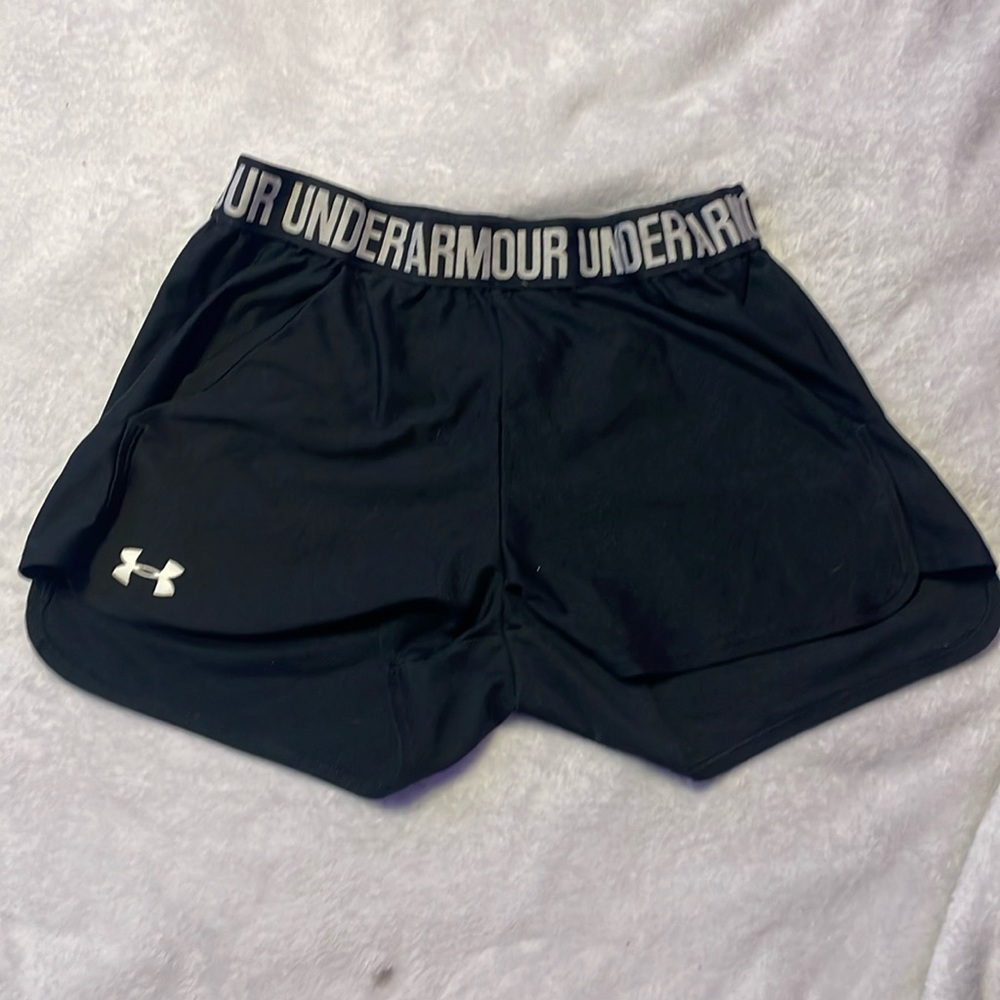 Under armor black shorts with white letters with pockets small